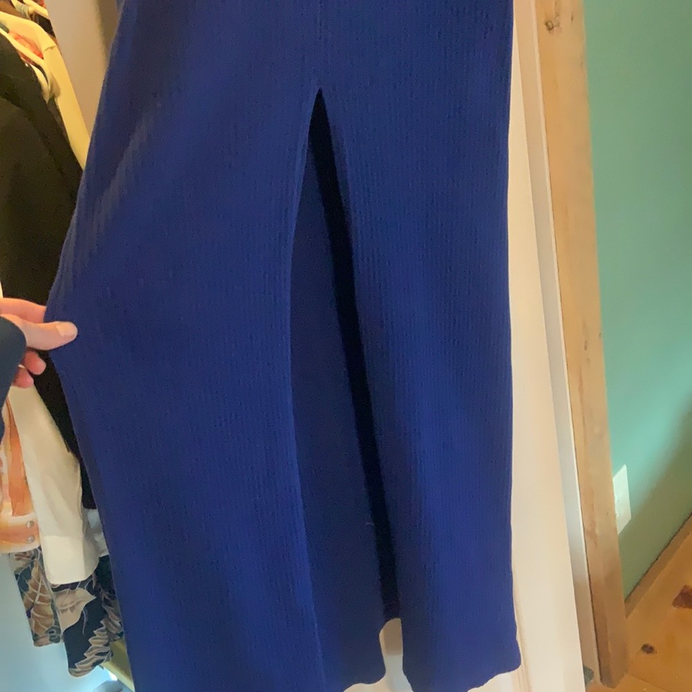 Free people long tank, split on side and in front. Size tag removed, size small